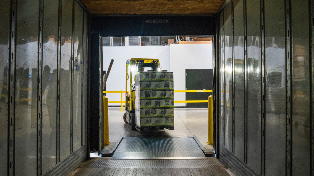 Forklift hauling merchandise